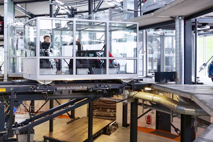 The new cars are rolled using a robotic-pallet system mounted on rails.